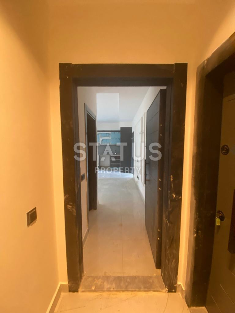 Новая квартира 1+1 в районе Махмутлар, 55 м2 фото 9