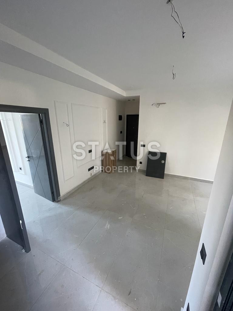 Новая квартира 1+1 в районе Махмутлар, 55 м2 фото 10