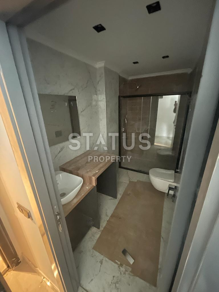 Новая квартира 1+1 в районе Махмутлар, 55 м2 фото 12