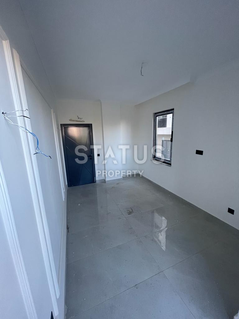 Новая квартира 1+1 в районе Махмутлар, 55 м2 фото 14