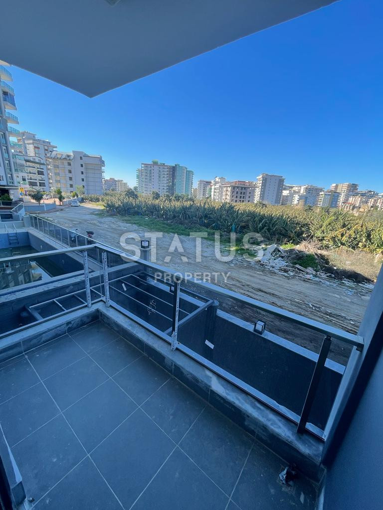 Новая квартира 1+1 в районе Махмутлар, 55 м2 фото 20