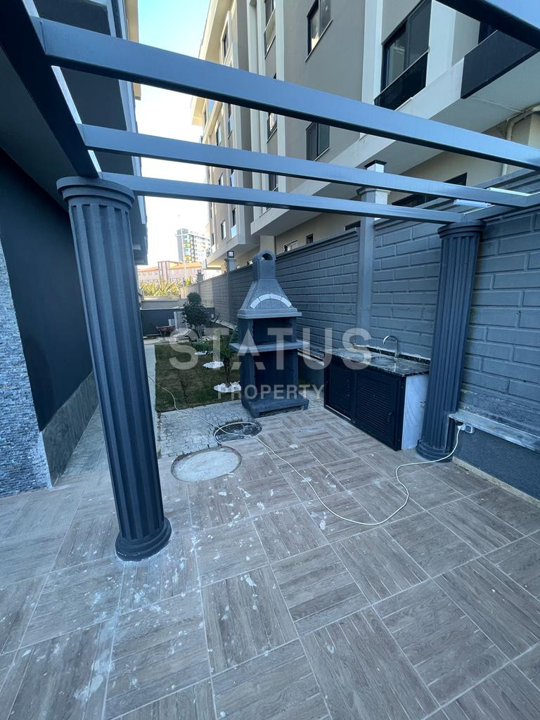 Новая квартира 1+1 в районе Махмутлар, 55 м2 фото 24