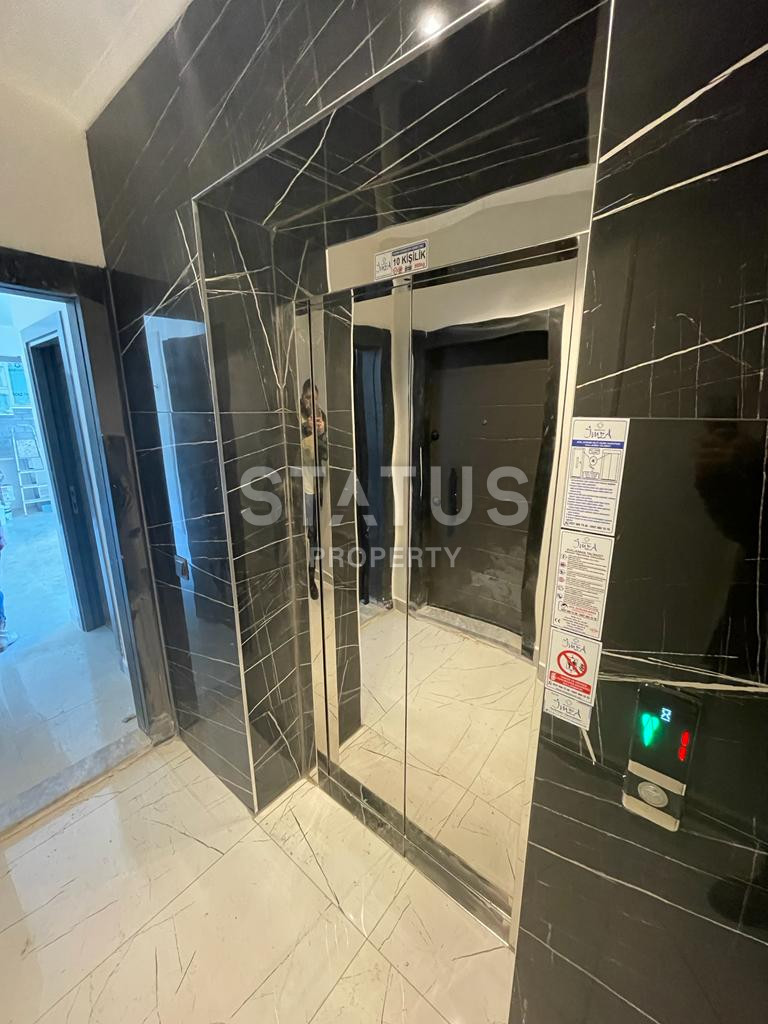 Новая квартира 1+1 в районе Махмутлар, 55 м2 фото 25