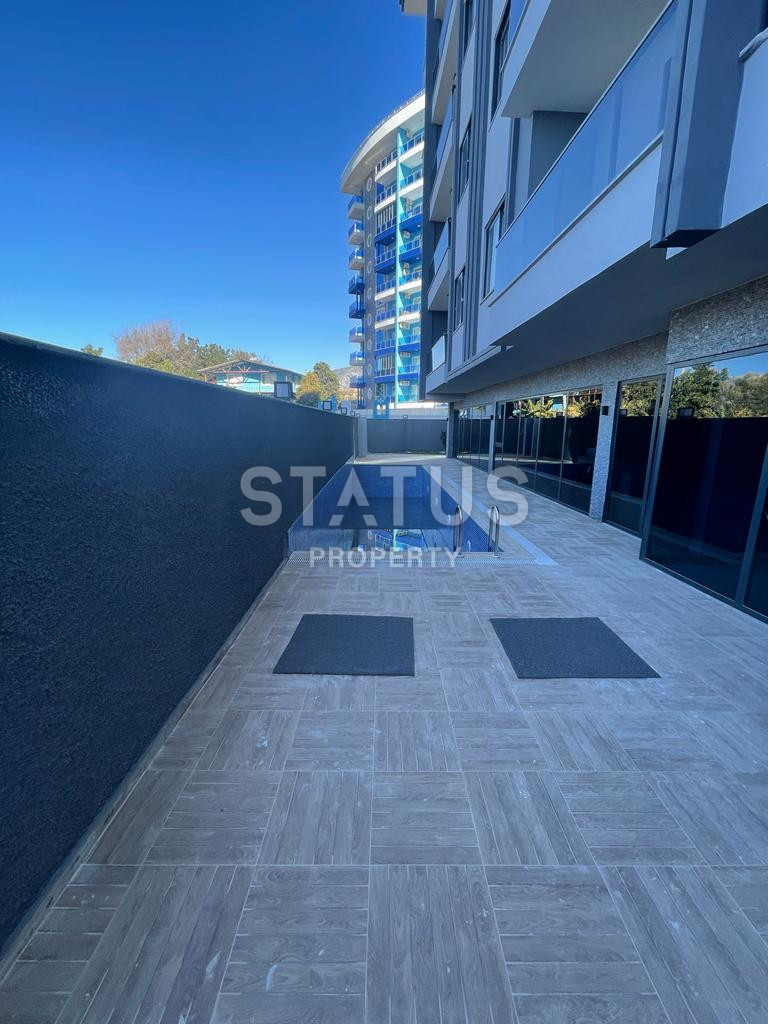 Новая квартира 1+1 в районе Махмутлар, 55 м2 фото 27