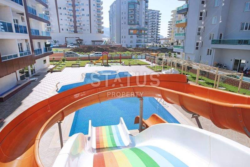 Новая трехкомнатная квартира в комплексе с собственной инфраструктурой в Махмутларе, 115 м2. фото 3