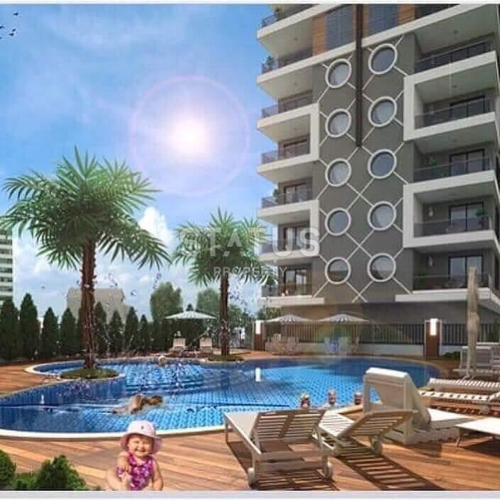 Квартира 1+1 в новом комплексе, 60 кв.м в Махмутларе. фото 3