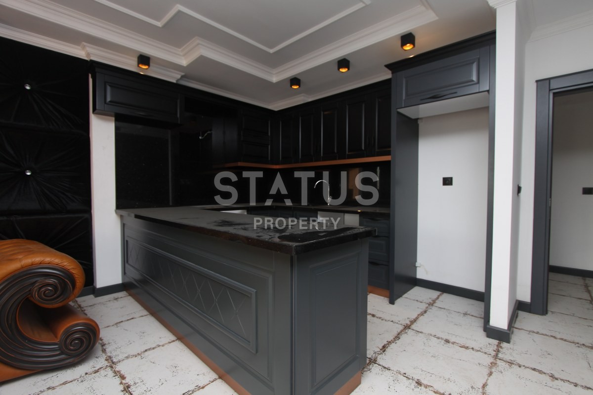 Трехкомнатные апартаменты с мебелью в престижном районе Тосмур, 115 кв. м. фото 12