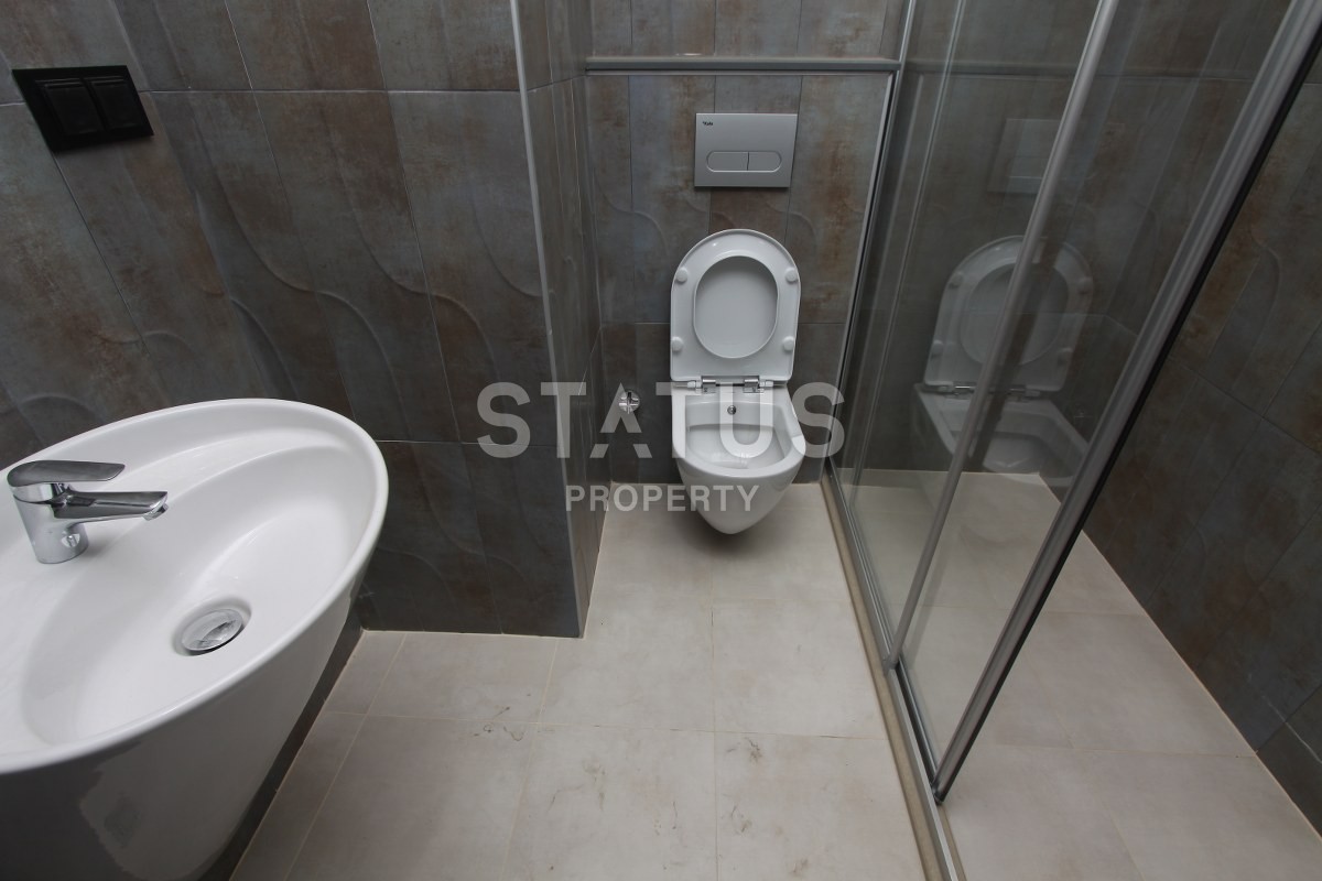 Трехкомнатные апартаменты с мебелью в престижном районе Тосмур, 115 кв. м. фото 15