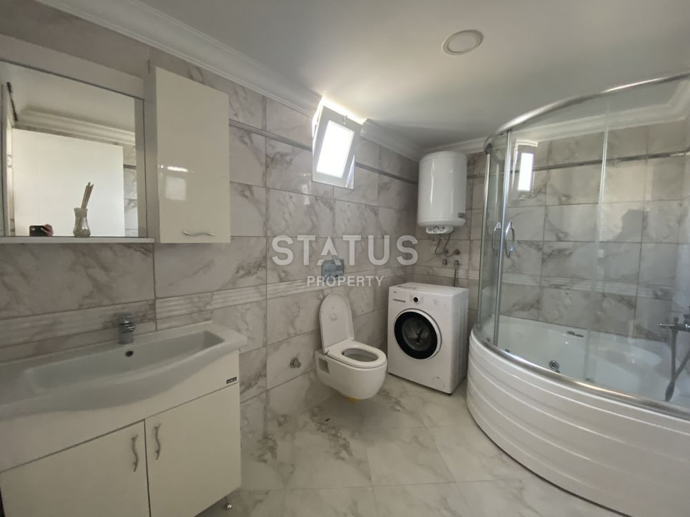 Трехуровневые апартаменты 3+1 с личной территорией в таунхаусе в одном из лучших комплексов в Авсалларе, 200м2 фото 9