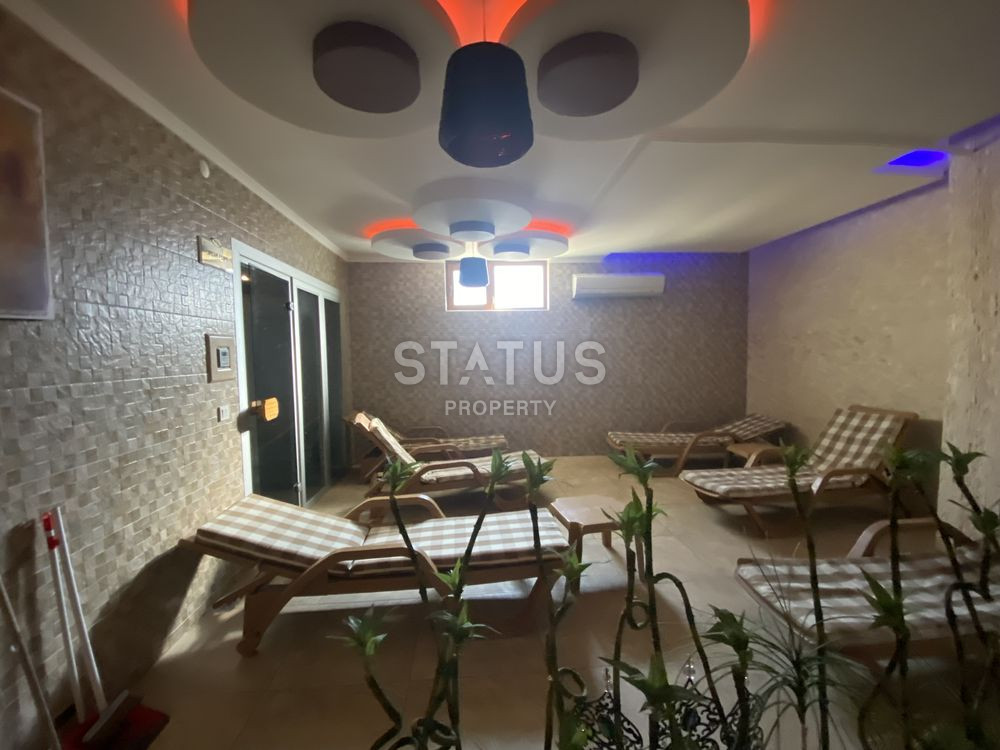 Трехуровневые апартаменты 3+1 с личной территорией в таунхаусе в одном из лучших комплексов в Авсалларе, 200м2 фото 36