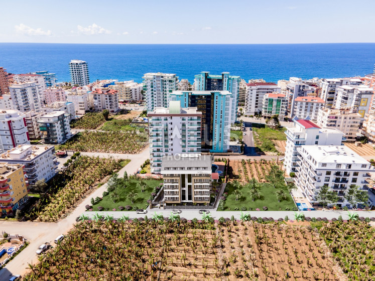 Инвестиционный проект в 5 минутах от моря в Махмутларе, от 51,5 кв.м. фото 1