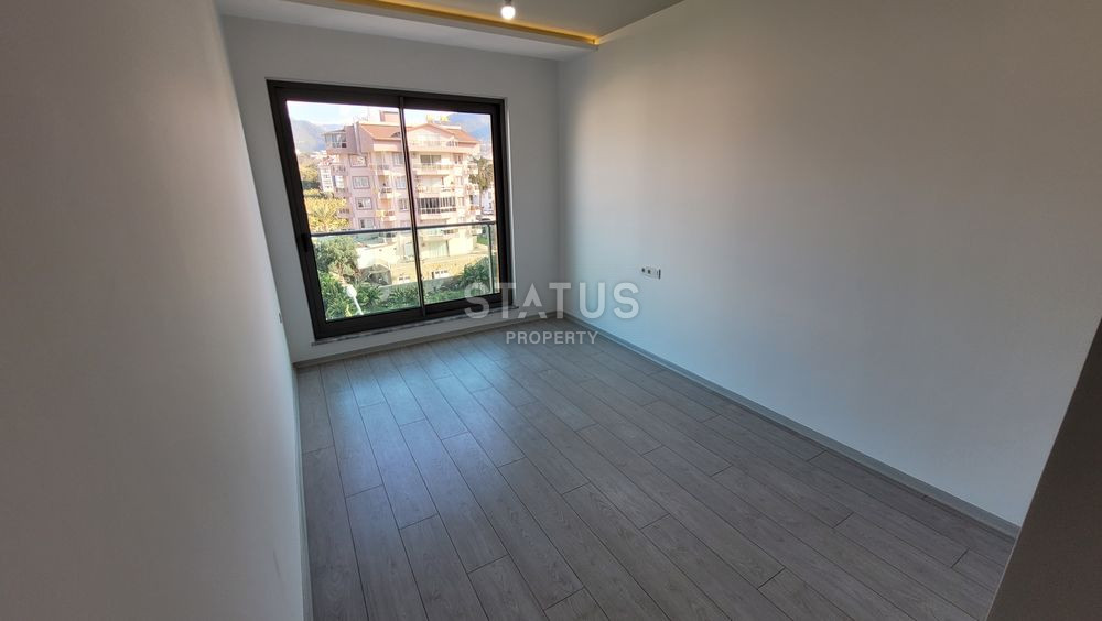 Просторная и светлая 2+1 в отличном комплексе, район Кестель. фото 9