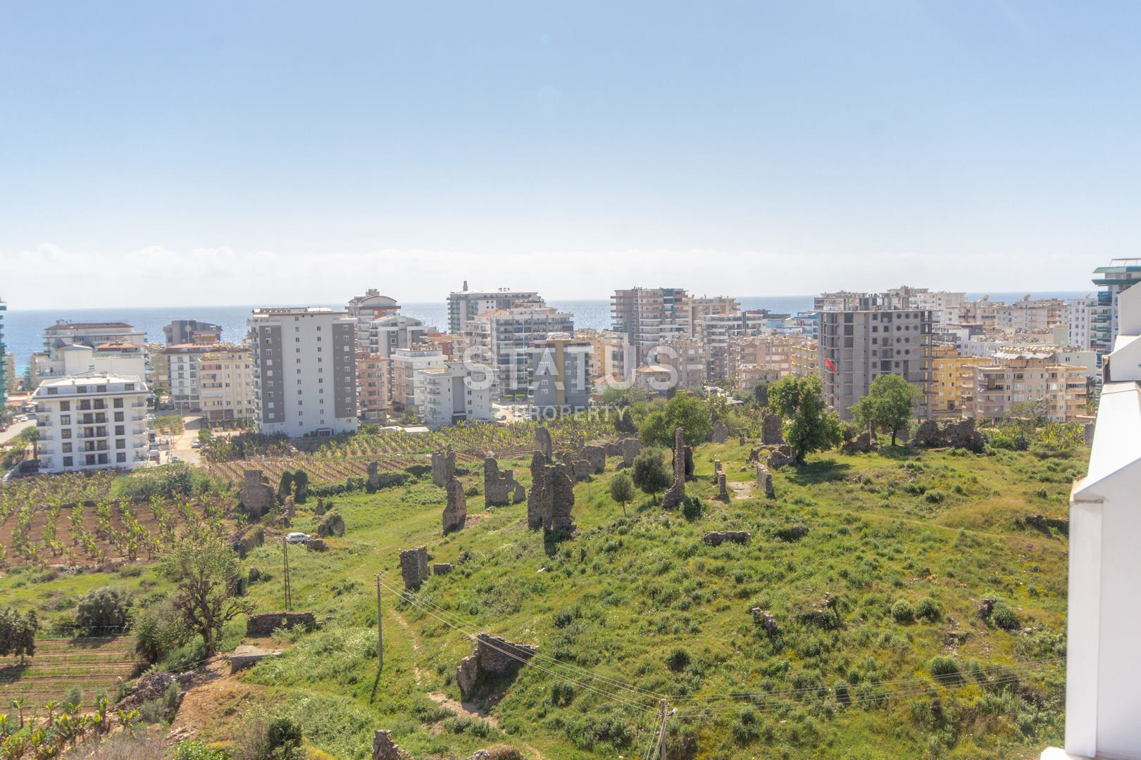 Ters-duplex 3+1 in Mahmutlar with a view of the mountains, the sea and the ancient city of Naula, 140m2 фото 3