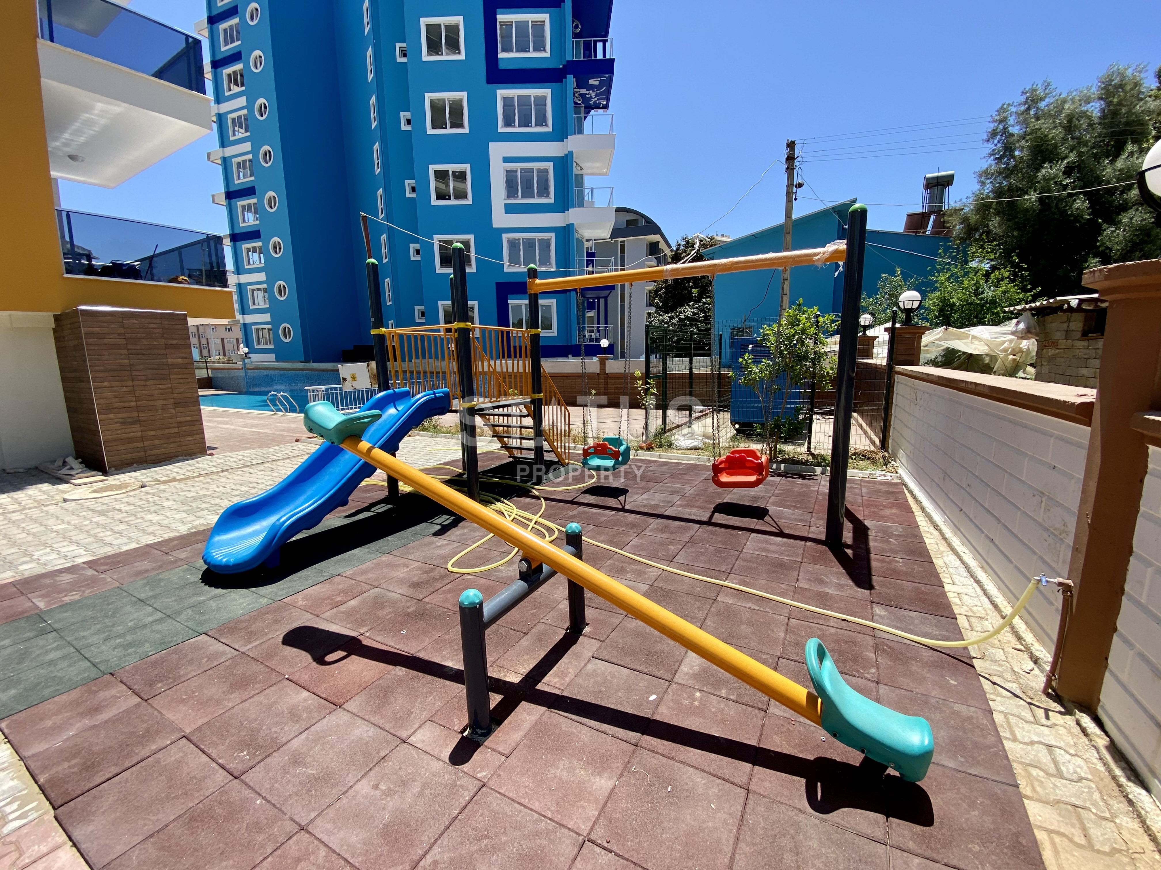 Ters-duplex 3+1 in Mahmutlar with a view of the mountains, the sea and the ancient city of Naula, 140m2 фото 12