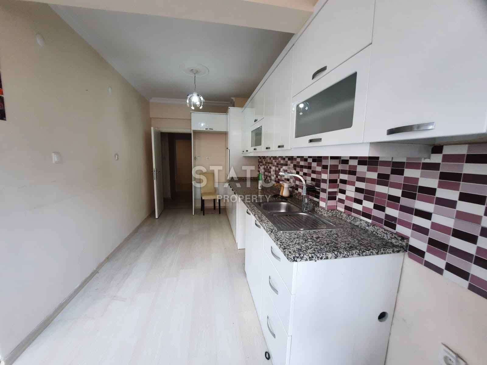 Четырехкомнатная квартира с отдельной кухней в центре Алании в 200м от моря, выгодная цена и прекрасная локация, 140м2 фото 3