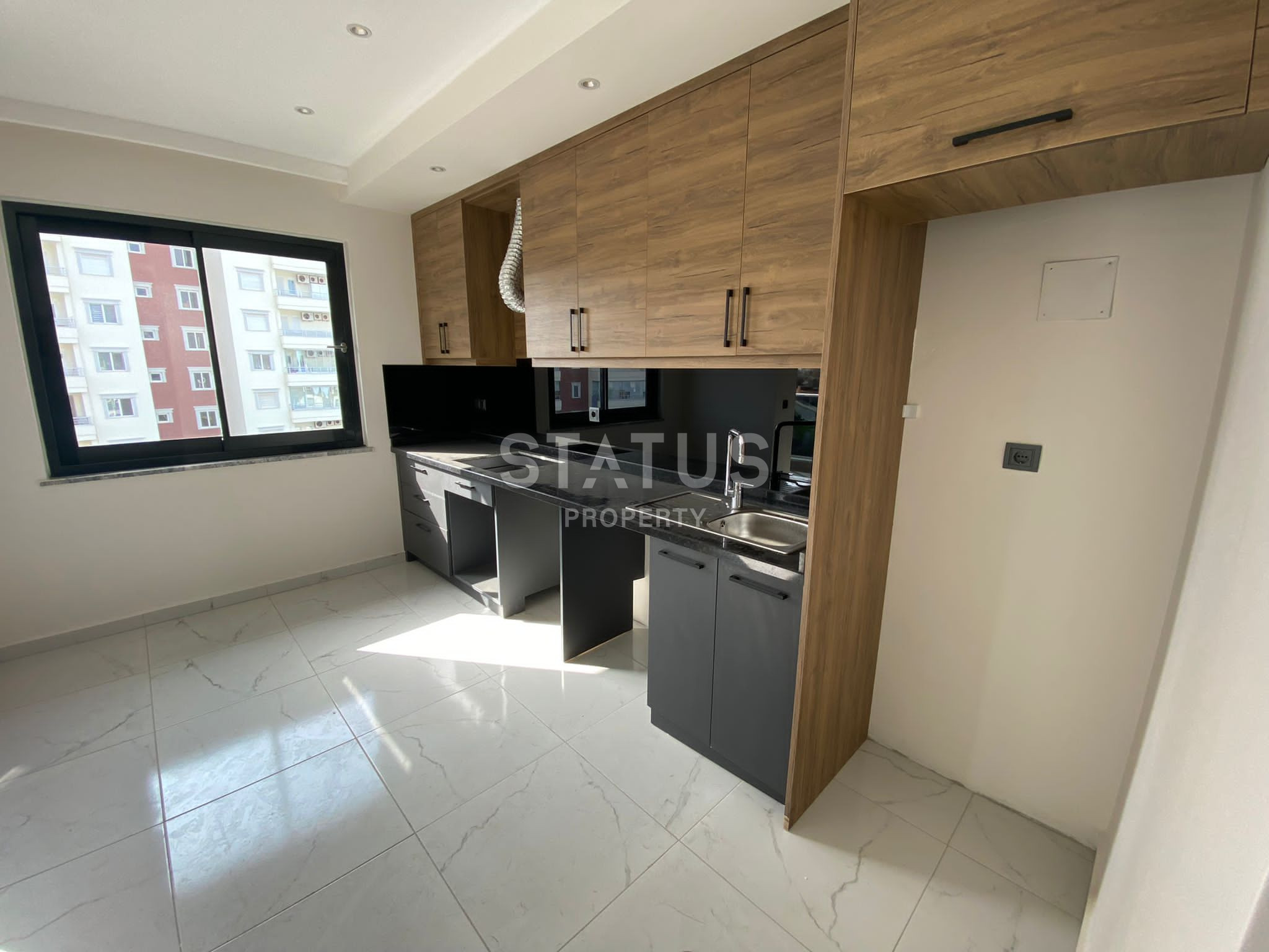 Два недорогих дублекса 2+1 в районе Оба в новом комплексе, очень удобная локация! фото 5