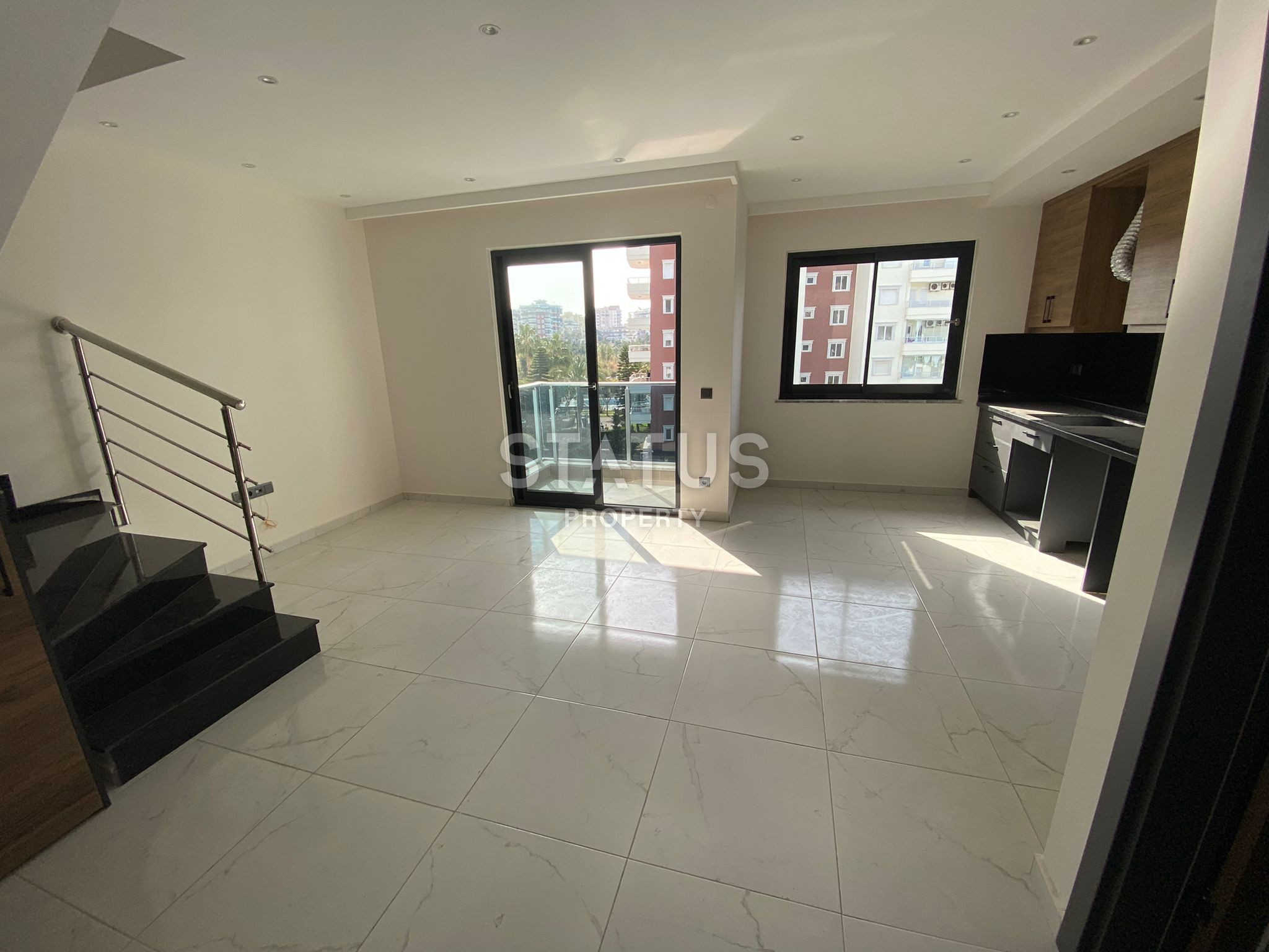 Два недорогих дублекса 2+1 в районе Оба в новом комплексе, очень удобная локация! фото 7