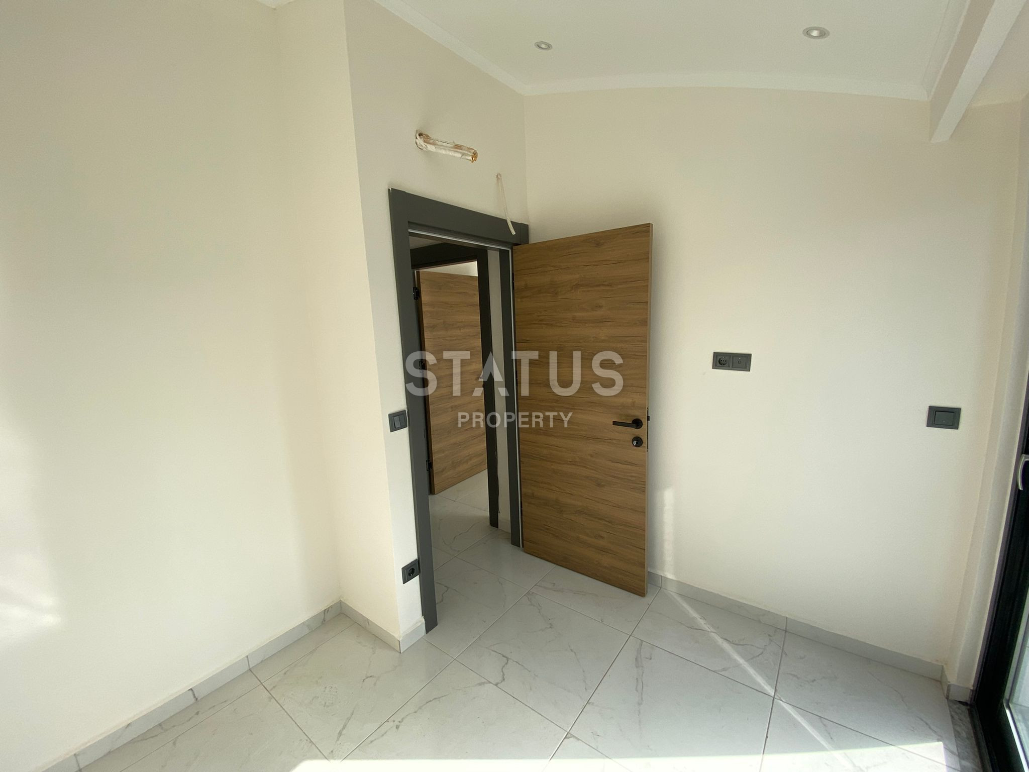 Два недорогих дублекса 2+1 в районе Оба в новом комплексе, очень удобная локация! фото 18