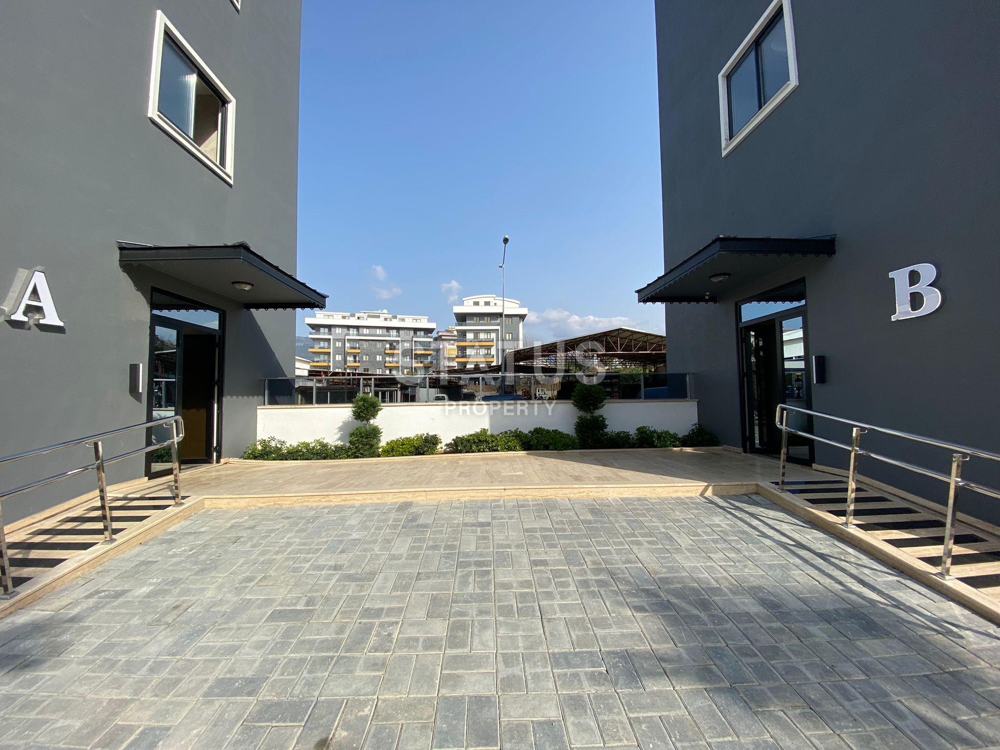 Два недорогих дублекса 2+1 в районе Оба в новом комплексе, очень удобная локация! фото 22