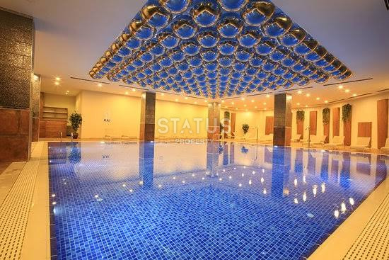 Дуплекс планировки 1+1 с дизайнерским ремонтом на первой береговой линии в районе Махмутлар, 65 кв.м. фото 4