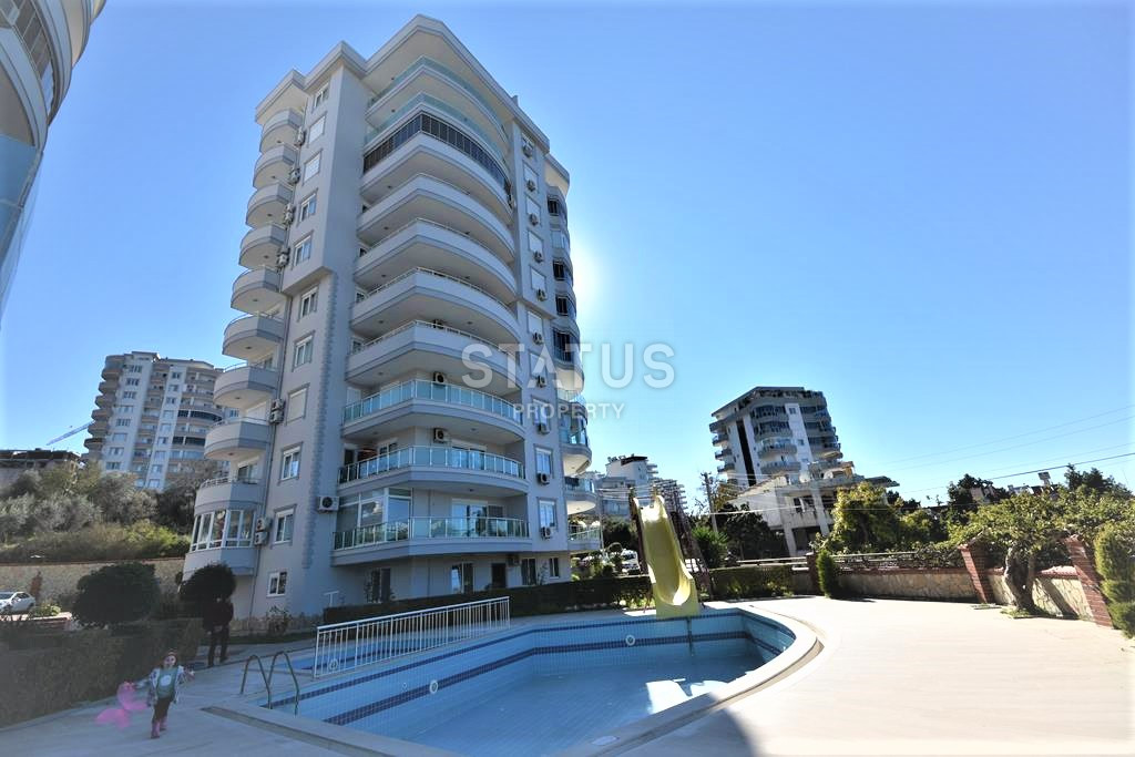 Bright 2+1 in Mahmutlar with a view of the sea and the Alanya fortress, affordable price! фото 3