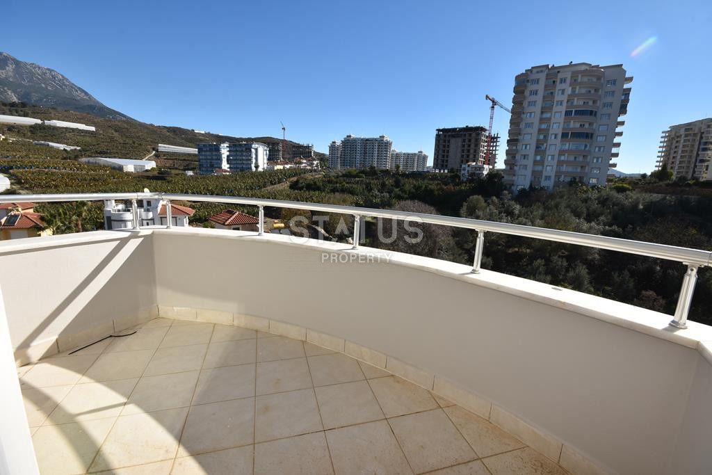 Bright 2+1 in Mahmutlar with a view of the sea and the Alanya fortress, affordable price! фото 17