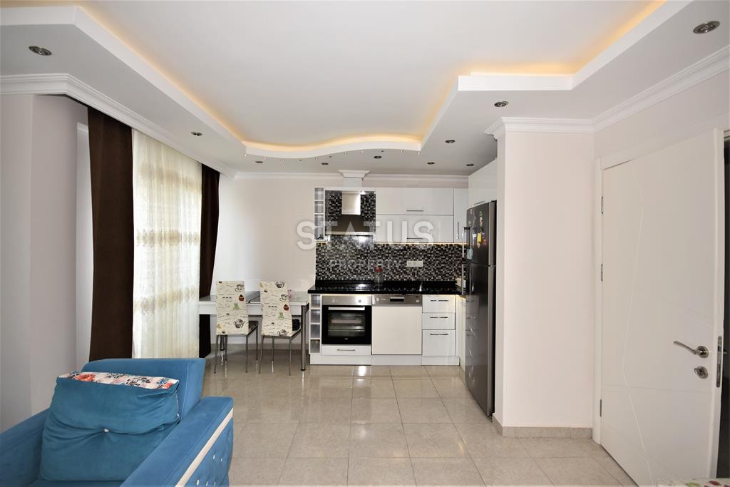 Просторная меблированная квартира у моря в Махмутларе, 70 м2. фото 9