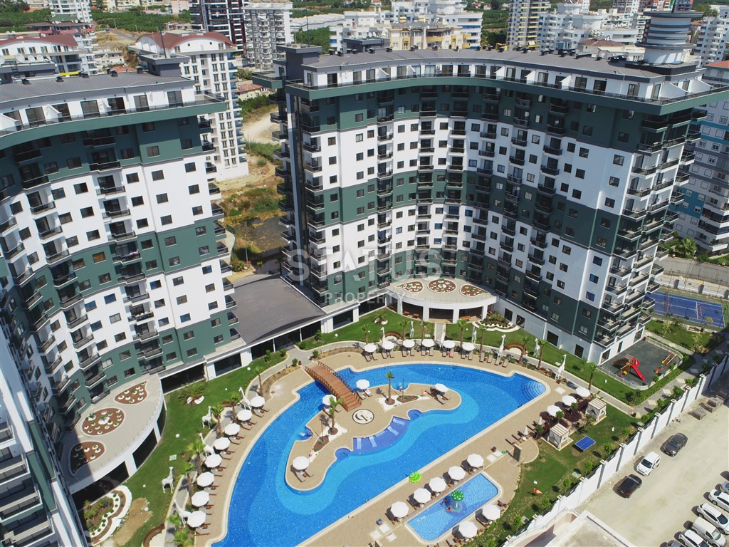 Элитные апартаменты 1+1 в новом комплексе в Махмутларе, 62 м2. фото 1