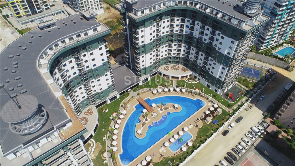 Элитные апартаменты 1+1 в новом комплексе в Махмутларе, 62 м2. фото 9