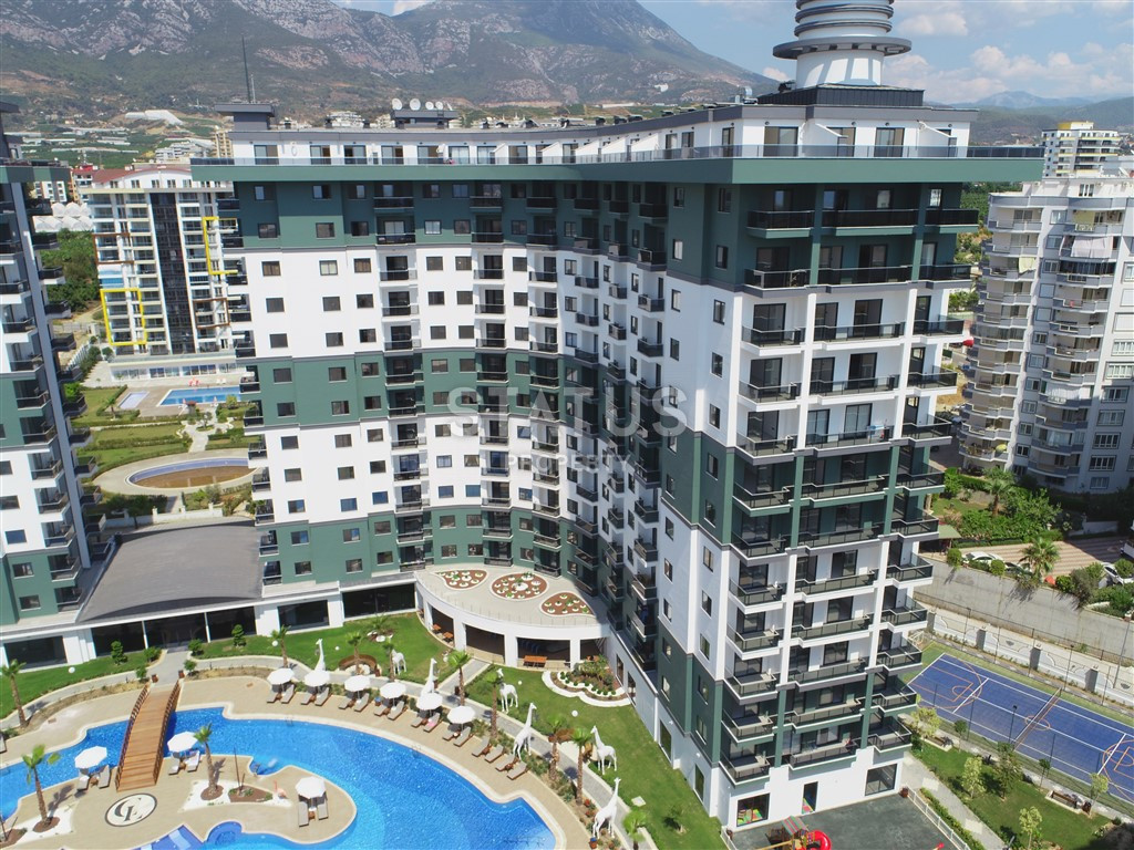 Элитные апартаменты 1+1 в новом комплексе в Махмутларе, 62 м2. фото 20