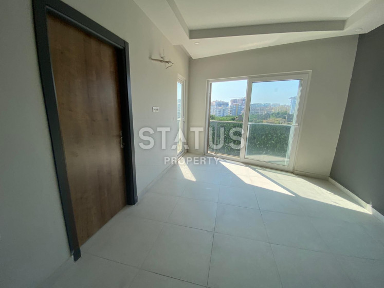 Квартира 1+1 в комплексе, окруженном природой в Махмутларе, 55 м2. фото 1