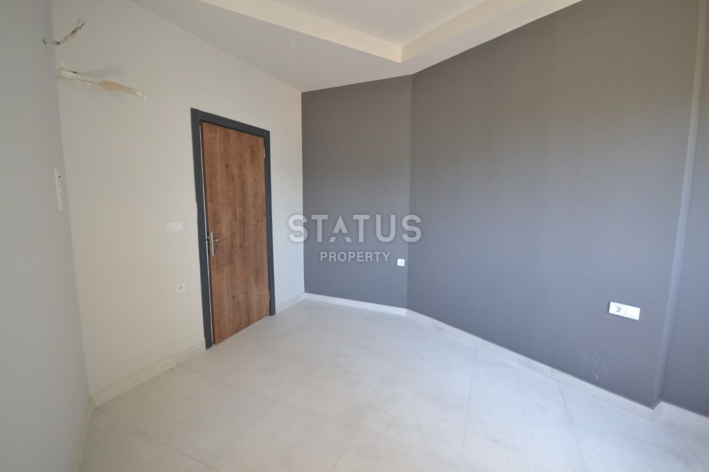 Apartment 1+1 in a complex surrounded by nature in Mahmutlar, 55 m2. фото 7