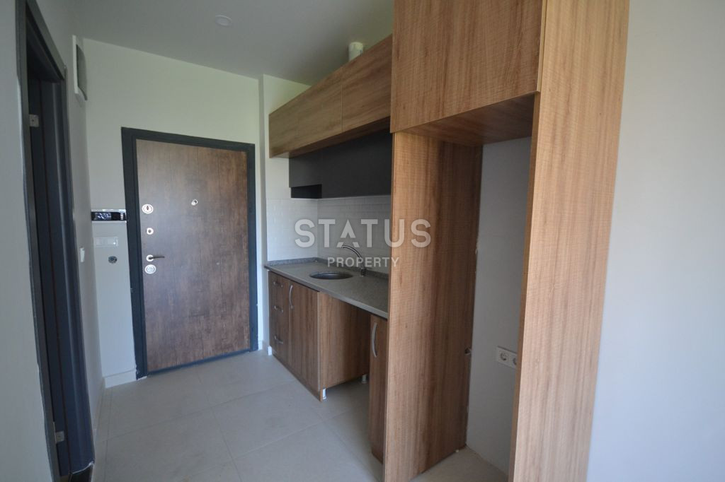 Apartment 1+1 in a complex surrounded by nature in Mahmutlar, 55 m2. фото 8