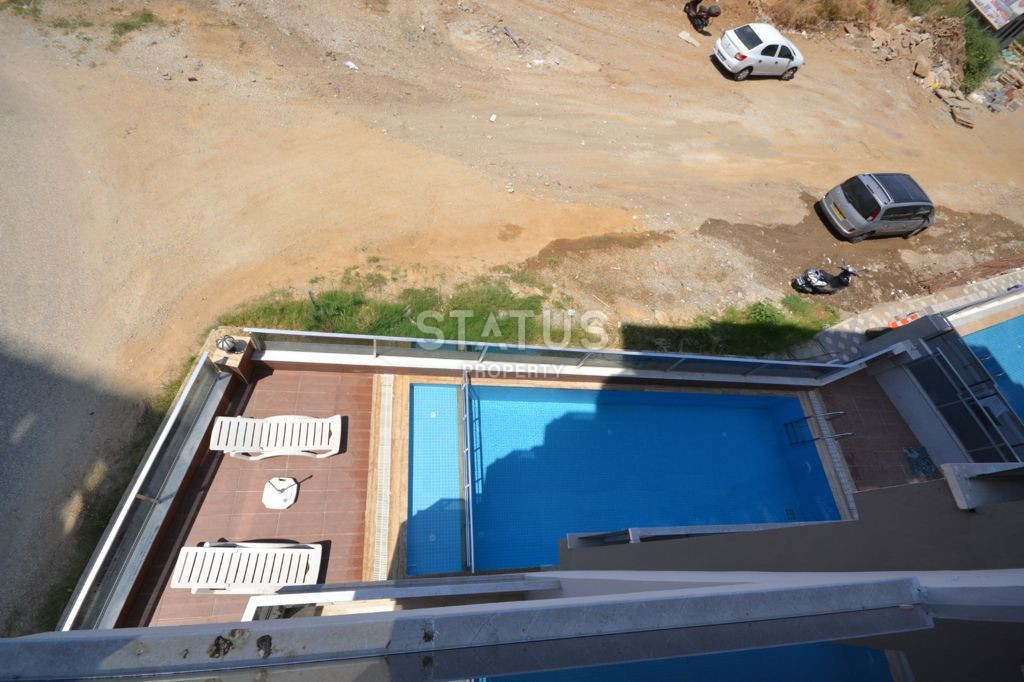 Apartment 1+1 in a complex surrounded by nature in Mahmutlar, 55 m2. фото 15