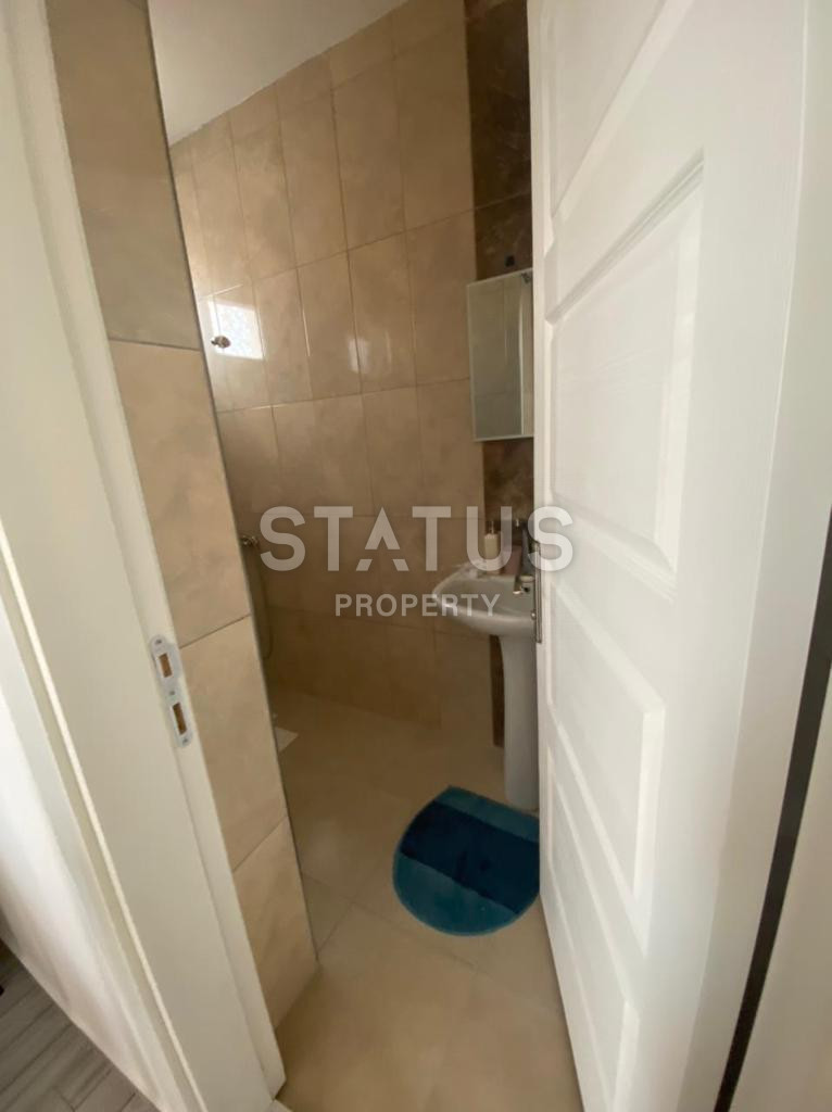 Большая двухкомнатная квартира в 100 метрах от моря в Махмутларе, 85 м2. фото 6