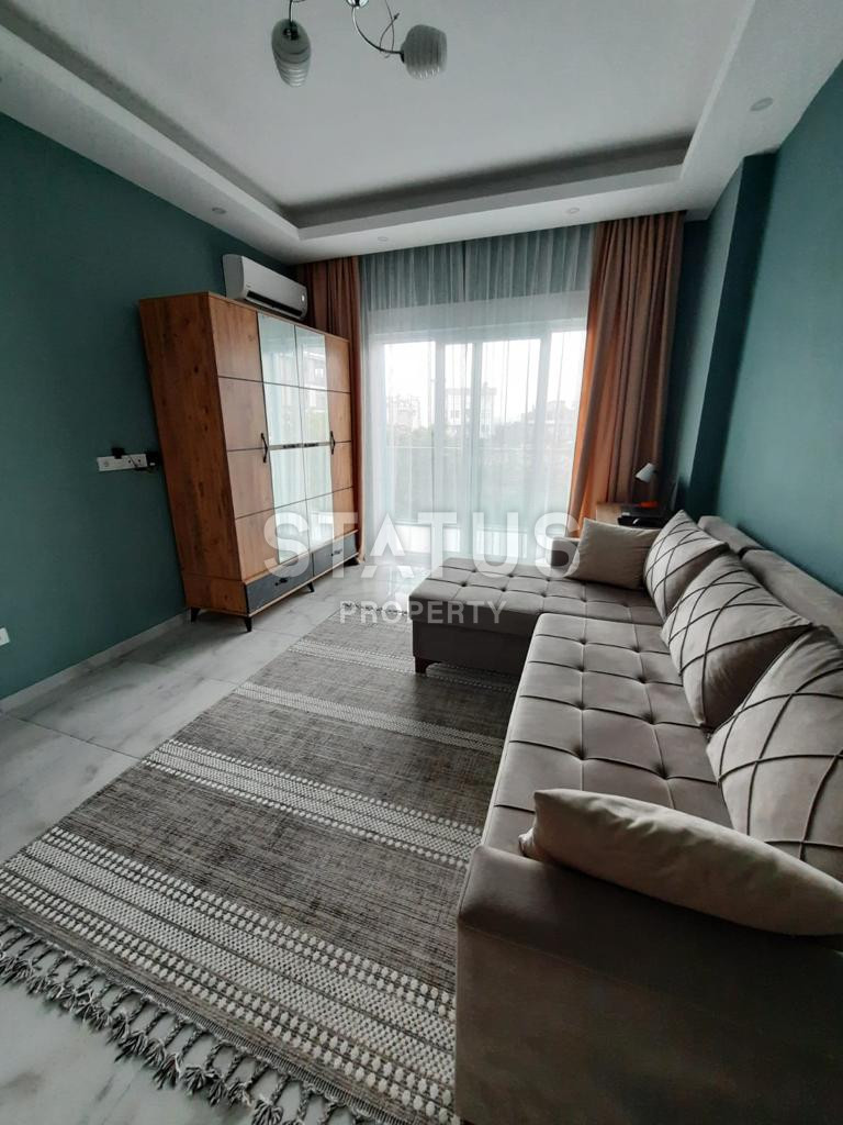 Меблированные апартаменты 1+1 в районе Оба, 60м2 фото 2