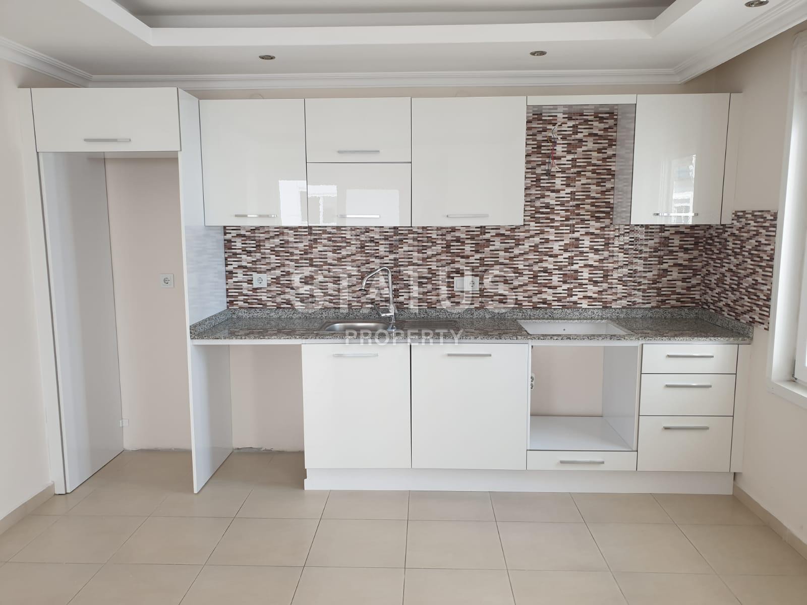 Огромная квартира 1+1  в центре Махмутлара по отличной цене. 85 кв.м. фото 3