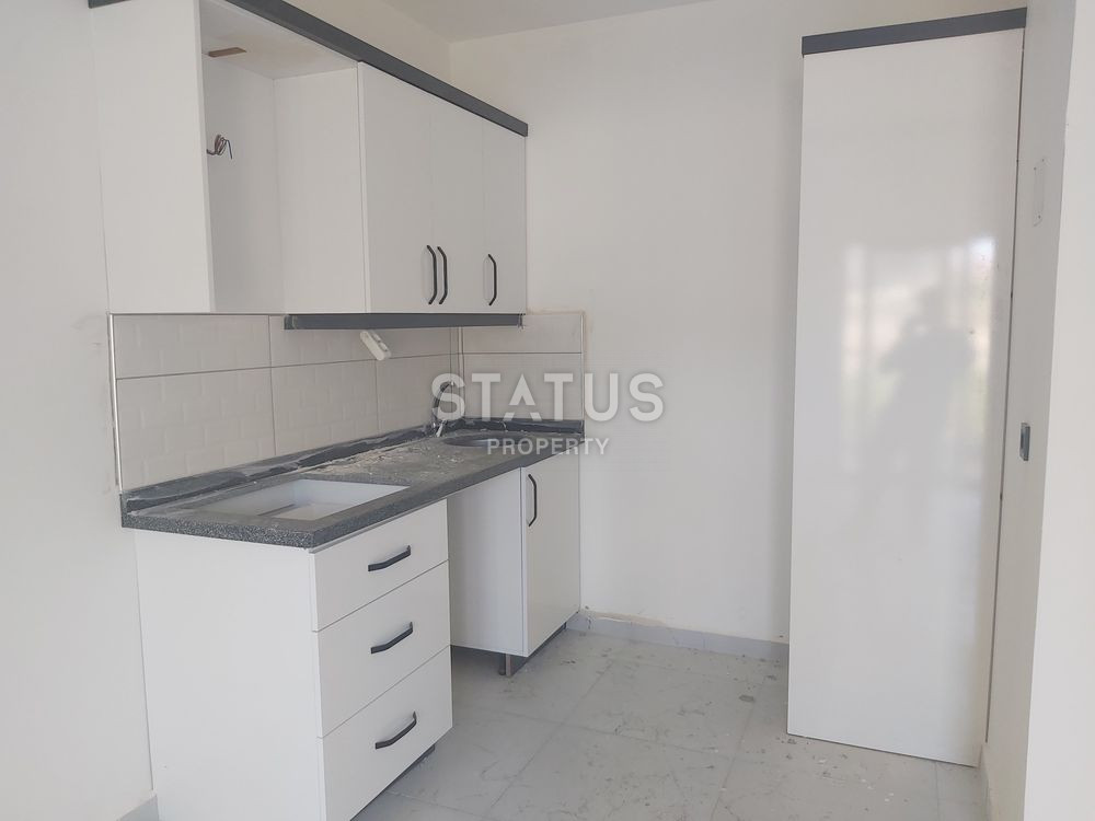 Новая квартира 1+1 в районе Махмутлар. 58м2 фото 2