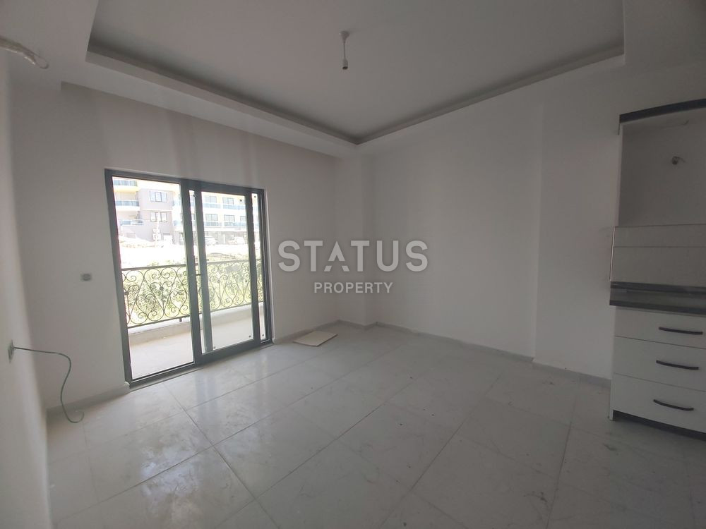 Новая квартира 1+1 в районе Махмутлар. 58м2 фото 3