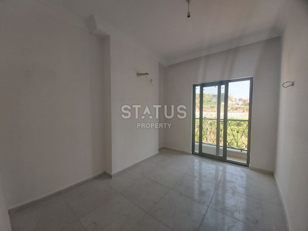 Новая квартира 1+1 в районе Махмутлар. 58м2 фото 5