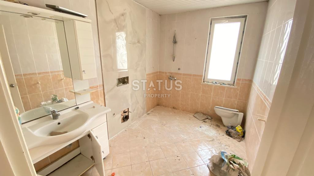 Не дорогая просторная двух-уровневая квартира  4+1 в Махмутларе. 180м2 фото 18