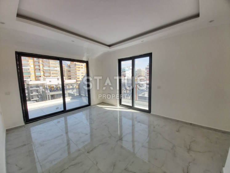 Spacious duplex with good location in Mahmutlar. 95m2 photos 1