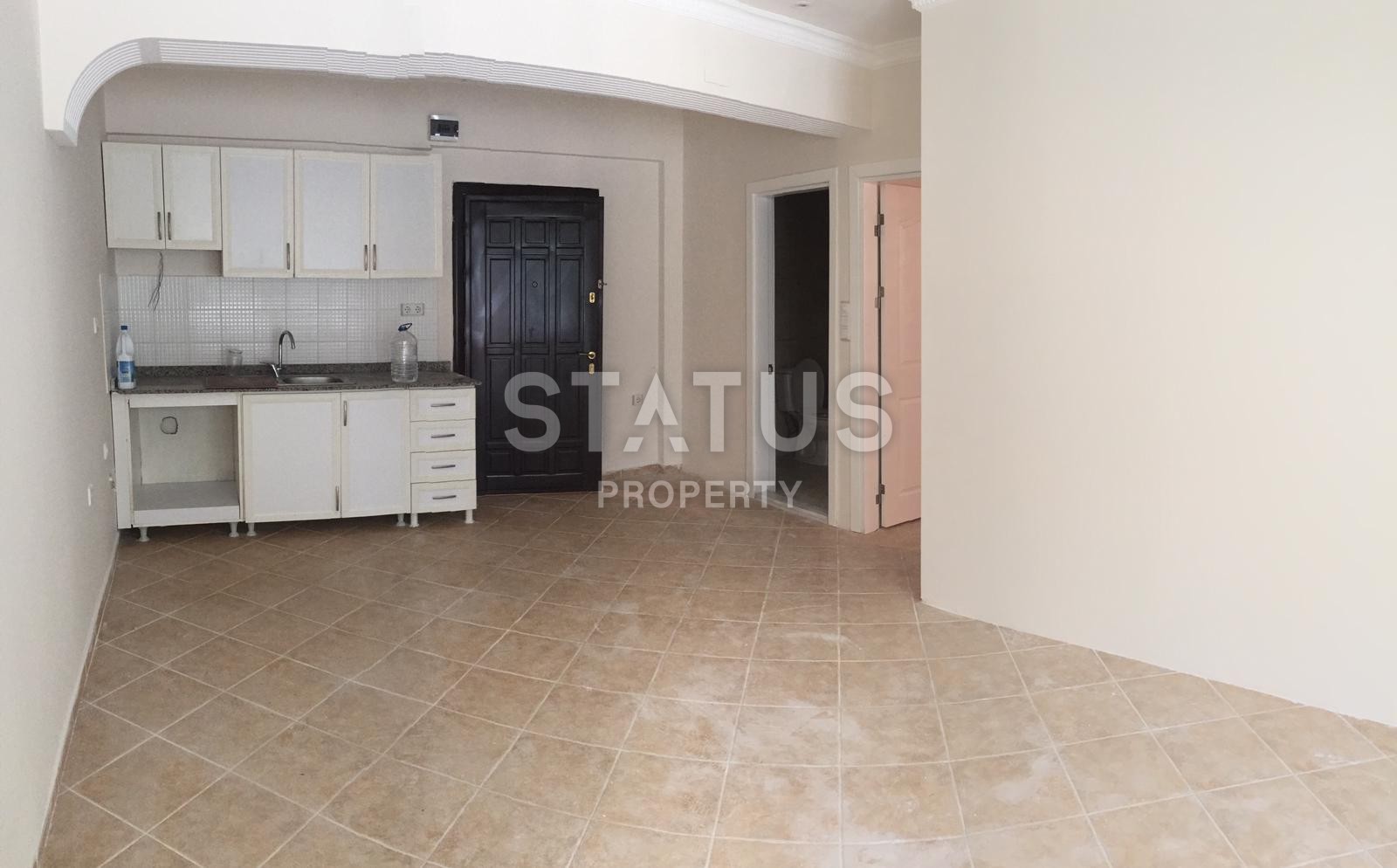 Эксклюзивная продажа! Квартира по супер цене в самом центре Махмутлара в комплексе с бассейном. 50 кв.м. фото 4