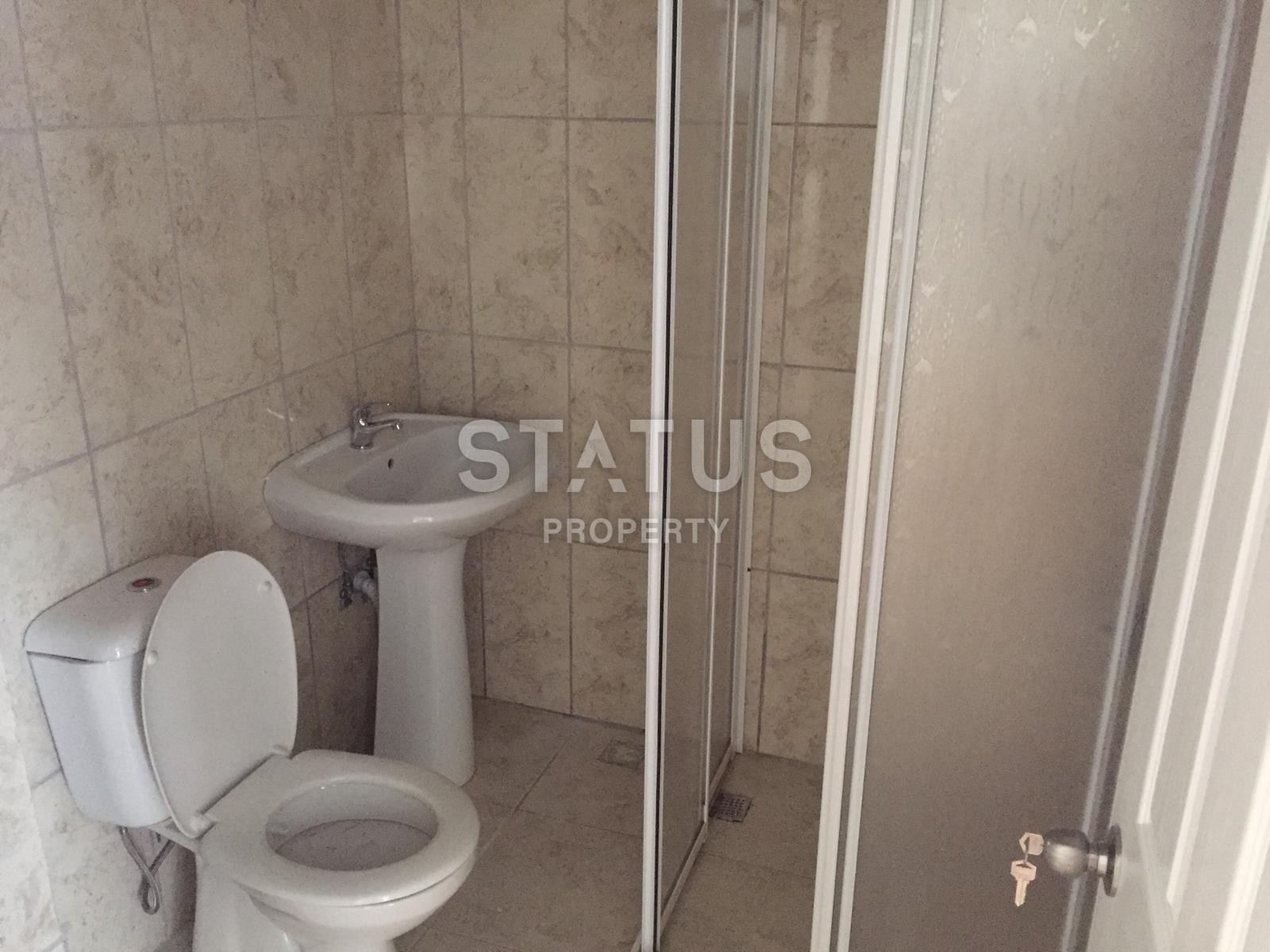 Эксклюзивная продажа! Квартира по супер цене в самом центре Махмутлара в комплексе с бассейном. 50 кв.м. фото 9