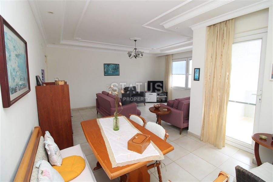 2+1 layout apartment with spacious living room and american style kitchen in Mahmutlar фото 3