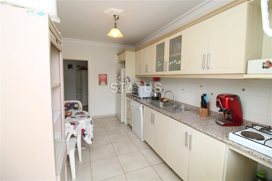 2+1 layout apartment with spacious living room and american style kitchen in Mahmutlar фото 4