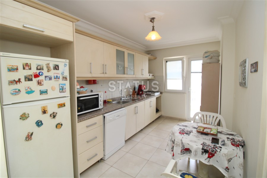 2+1 layout apartment with spacious living room and american style kitchen in Mahmutlar фото 5