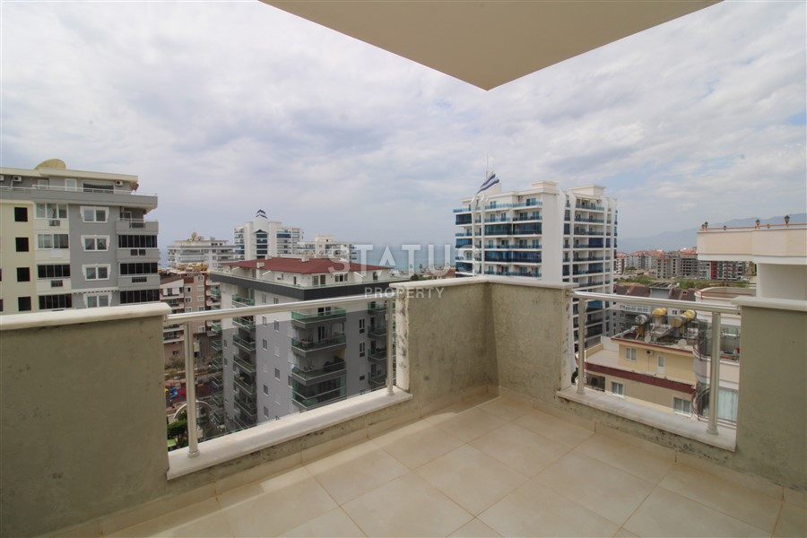 2+1 layout apartment with spacious living room and american style kitchen in Mahmutlar фото 10