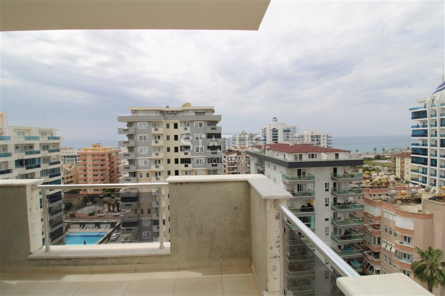 2+1 layout apartment with spacious living room and american style kitchen in Mahmutlar фото 11