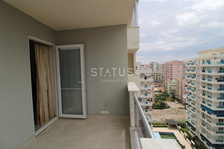 2+1 layout apartment with spacious living room and american style kitchen in Mahmutlar фото 12